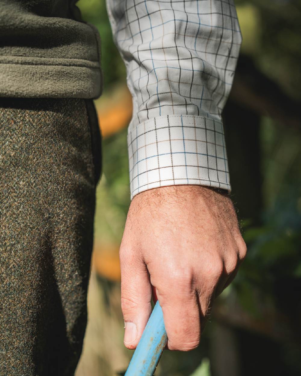 Naval Blue Coloured Harkila Portfield Long Sleeve Shirt on blurry background 