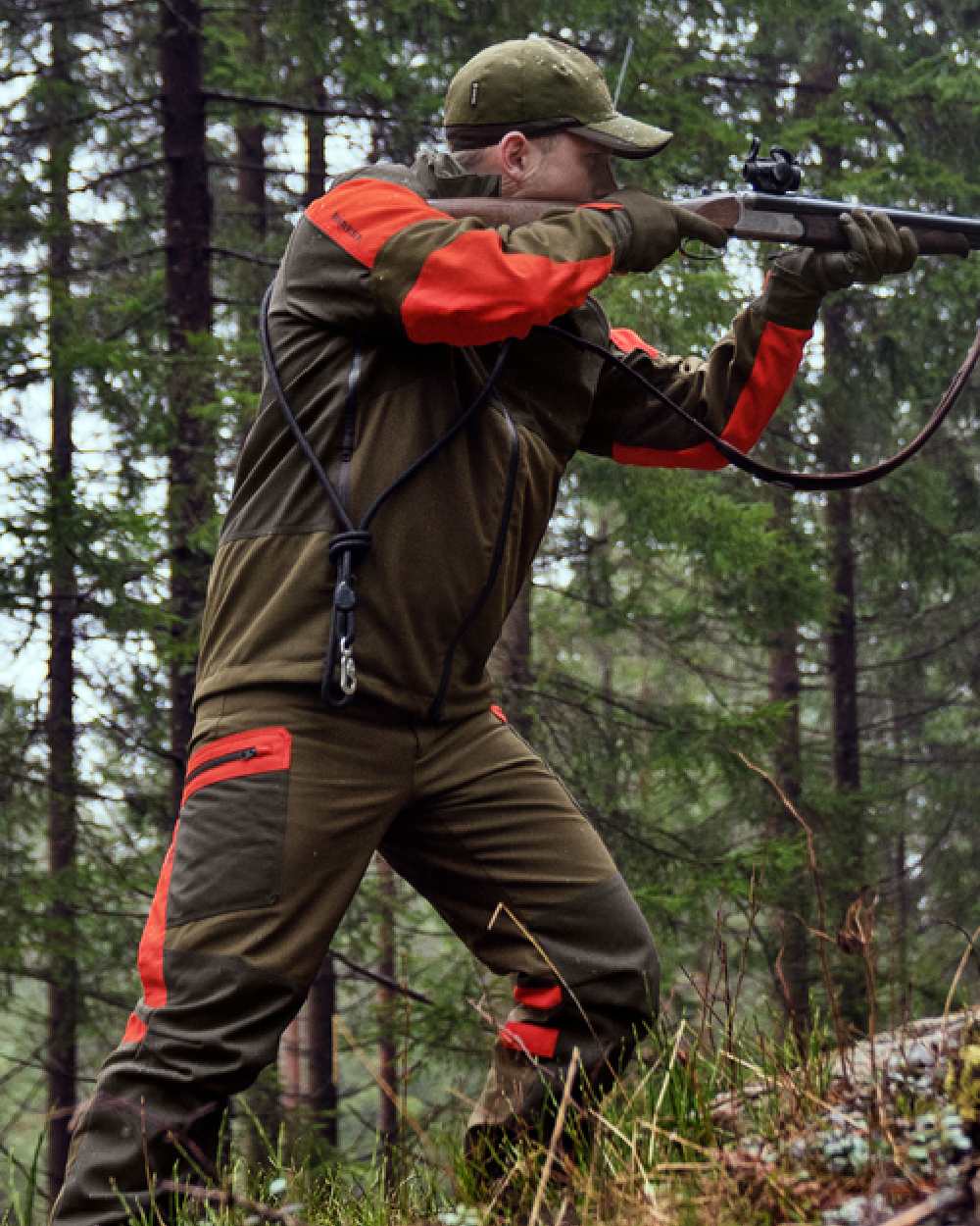 Willow Green Orange Coloured Harkila Pro Hunter Dog Keeper GTX Jacket on outdoor background 