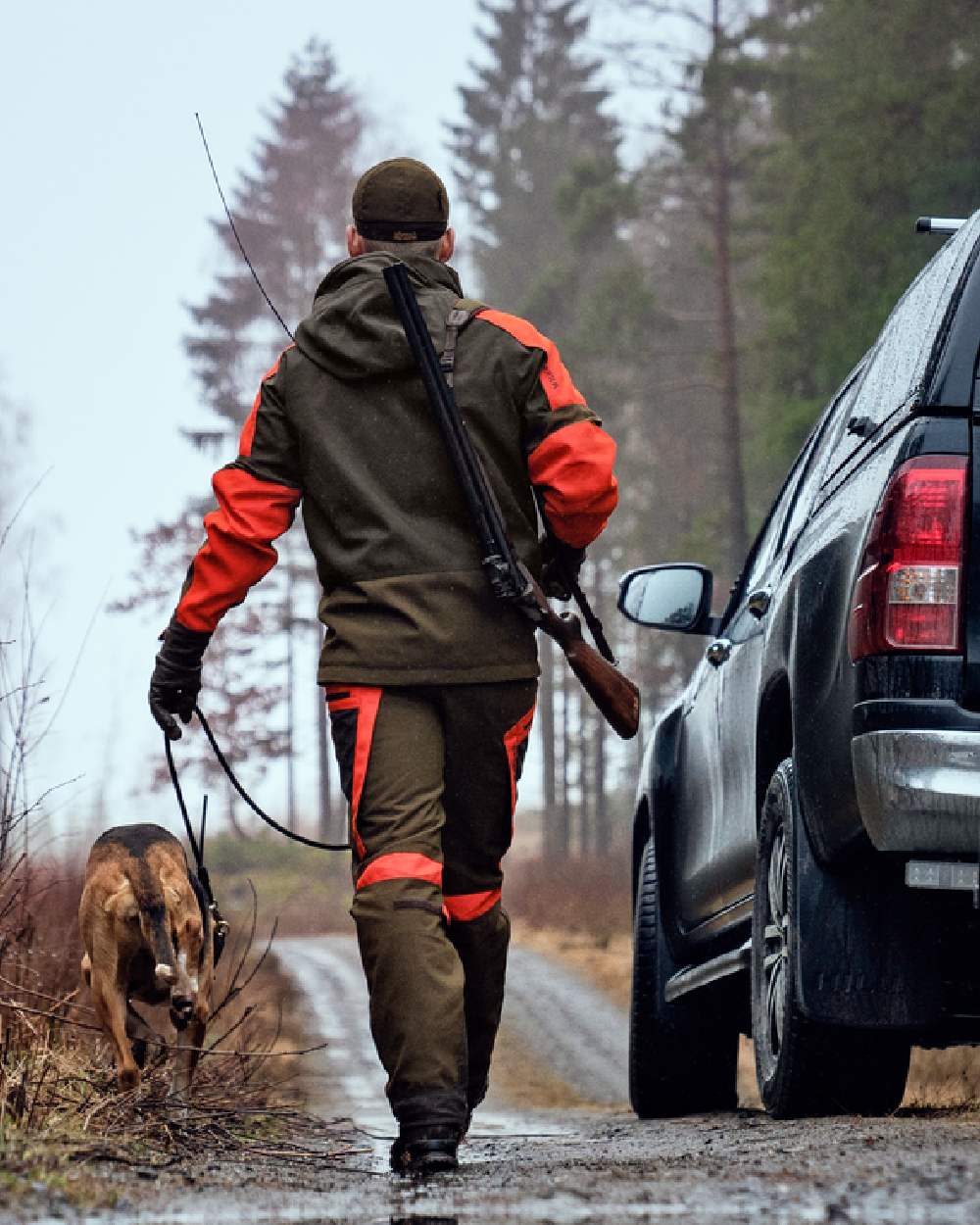 Willow Green Orange Coloured Harkila Pro Hunter Dog Keeper GTX Jacket on outdoor background 