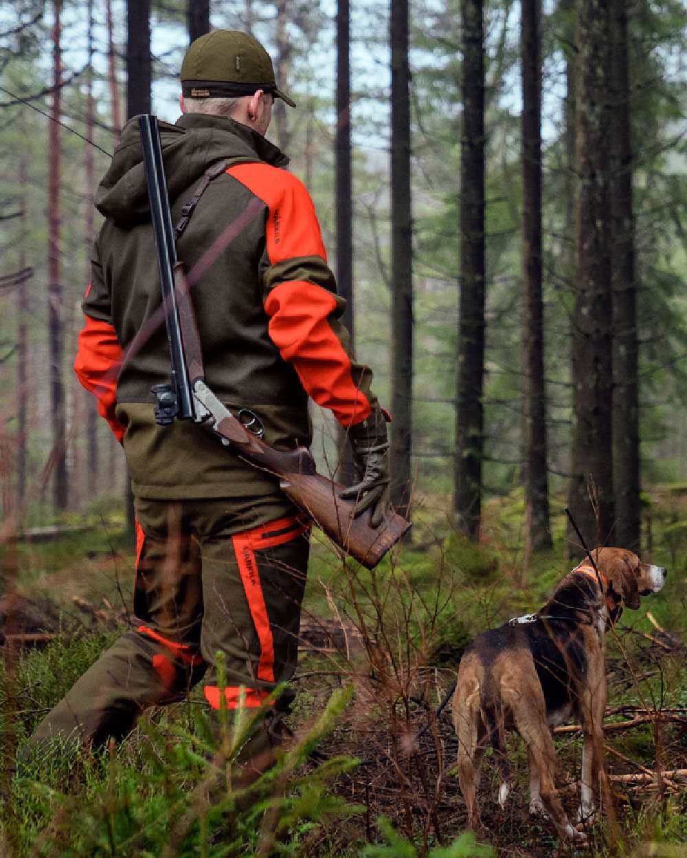 Willow Green Orange Coloured Harkila Pro Hunter Dog Keeper GTX Jacket on outdoor background 