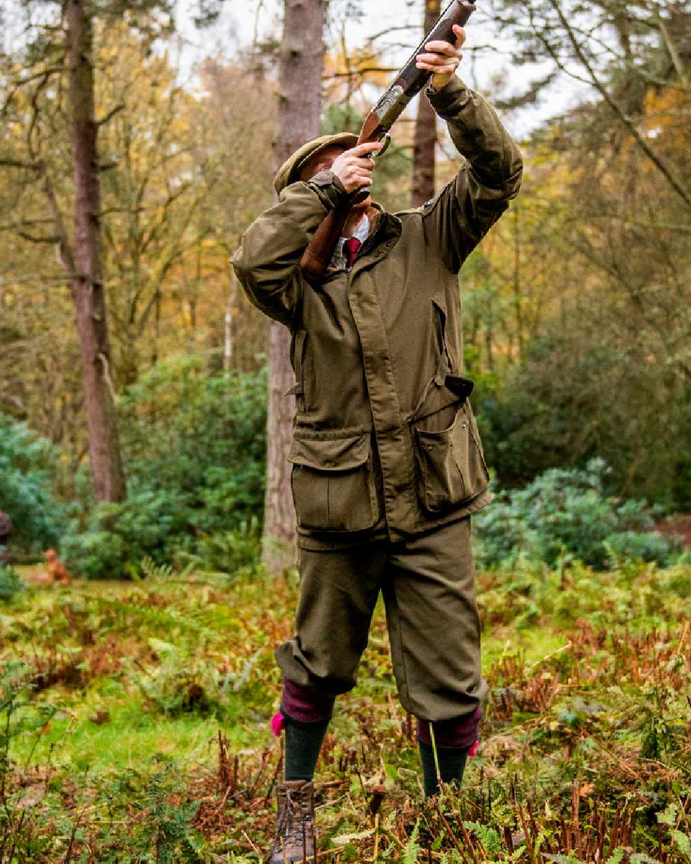 Willow Green Coloured Harkila Pro Hunter Endure Jacket on forest background 