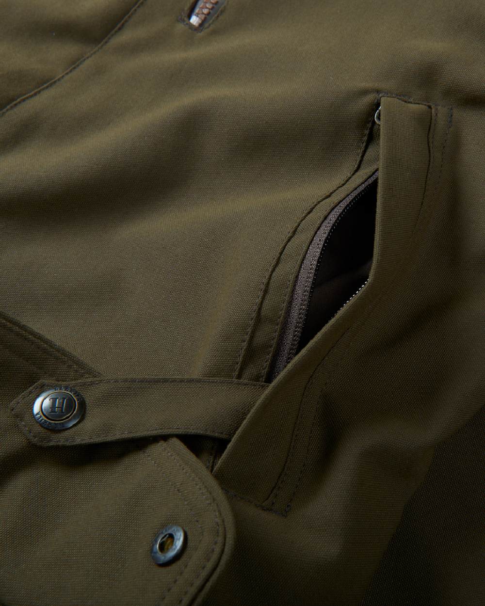 Willow Green Coloured Harkila Pro Hunter Endure Jacket on outdoor background 