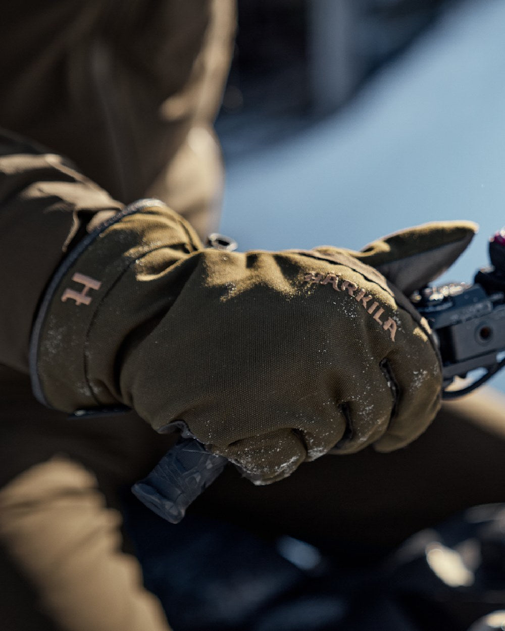 Willow Green Shadow Brown Coloured Harkila Pro Hunter GTX Gloves on outdoor background 