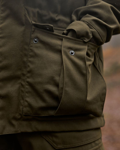 Willow Green Coloured Harkila Pro Hunter GTX Legacy Jacket on outdoor background 