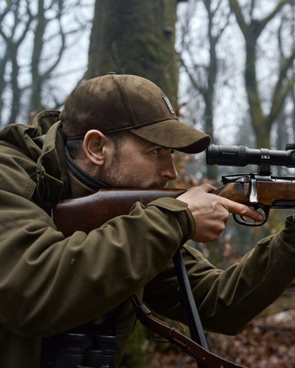 Willow Green Coloured Harkila Pro Hunter GTX Legacy Jacket on outdoor background 