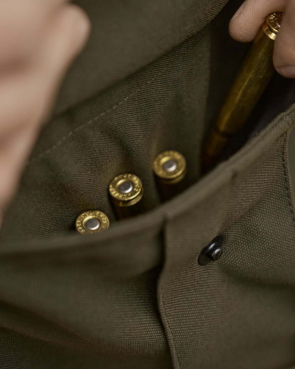 Willow Green Coloured Harkila Pro Hunter GTX Legacy Trousers on outdoor background 