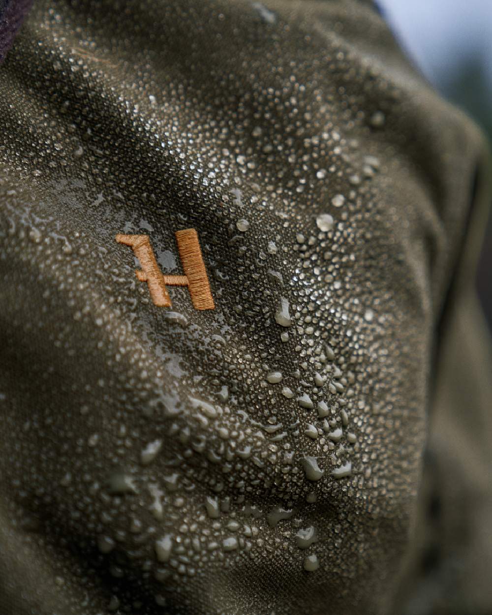 Willow Green Coloured Harkila Pro Hunter Move 2.0 GTX Jacket on outdoor background 