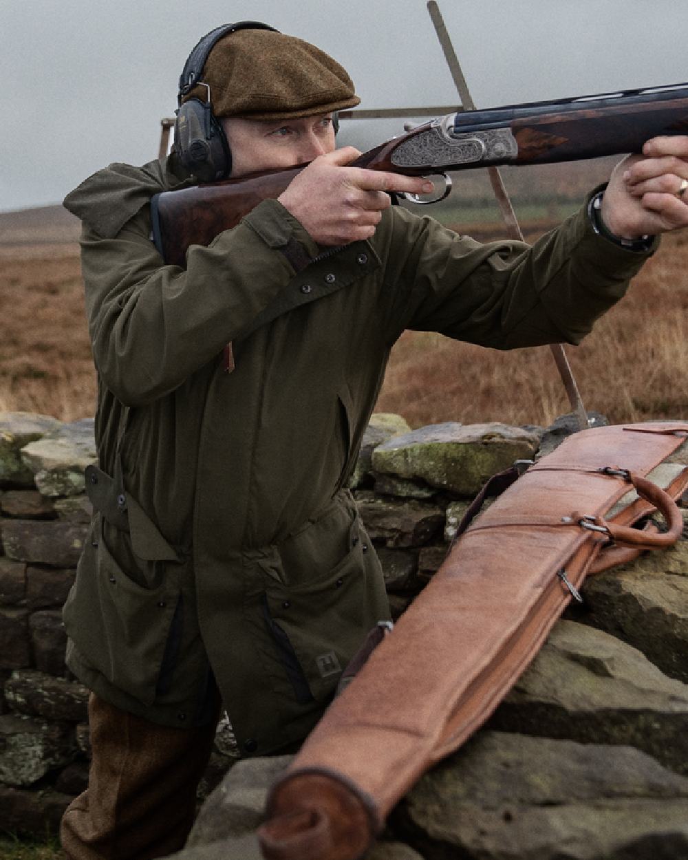 Willow Green Coloured Harkila Pro Hunter Shooting GTX Jacket on outdoor background 