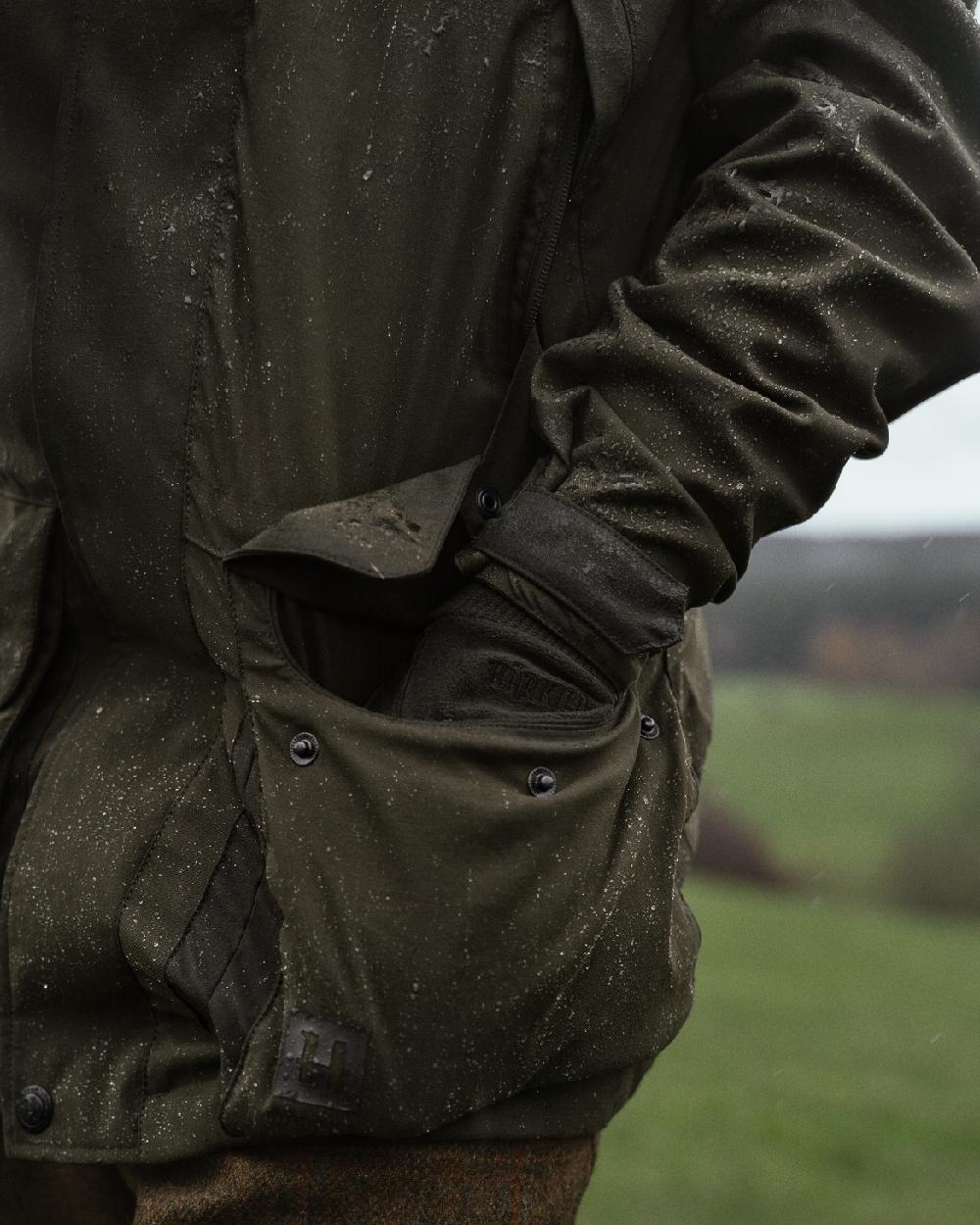 Willow Green Coloured Harkila Pro Hunter Shooting GTX Jacket on outdoor background 