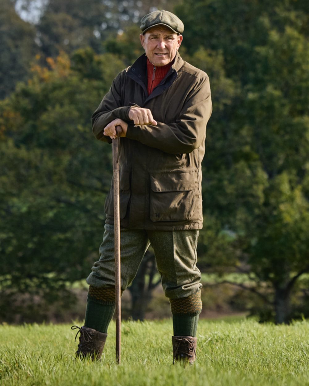 Willow Green Coloured Harkila Pro Hunter Shooting GTX Jacket on forest background 