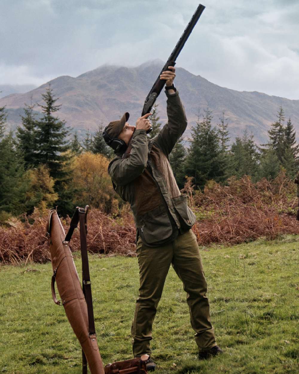 Willow Green Coloured Harkila Rannoch HWS Shooting Jacket on forest background 