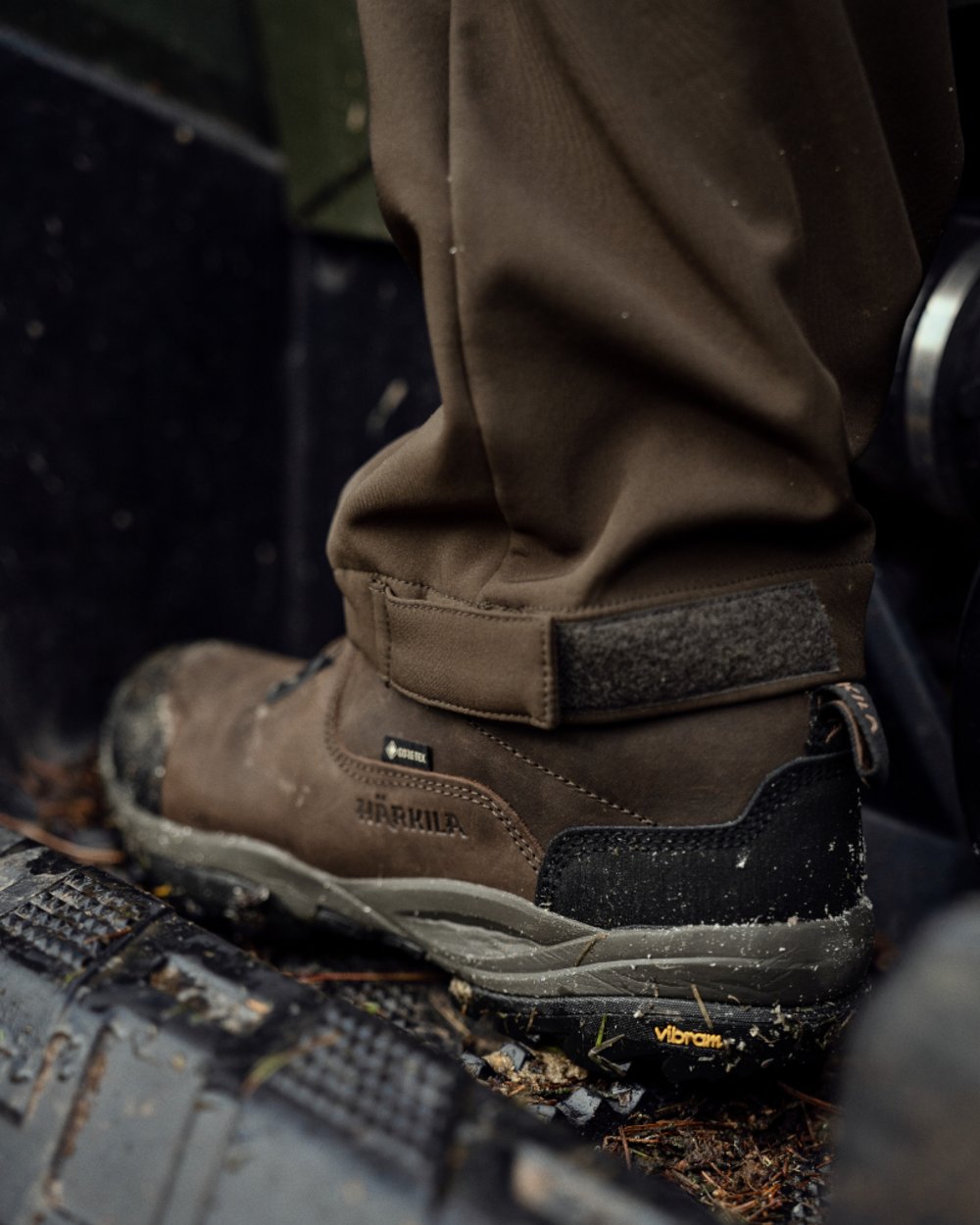 Dark Brown Coloured Harkila Reidmar Low GTX Shoes on car background 