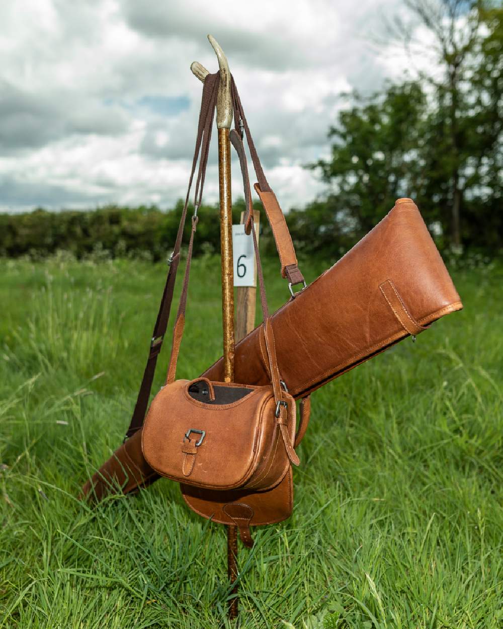 Cognac Coloured Harkila Retrieve Cartridge Bag 125 Cartridges on forest background 