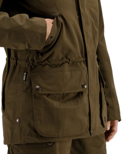 Warm Olive Coloured Harkila Retrieve Lady Jacket on white background 