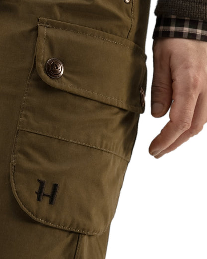 Warm Olive Coloured Harkila Retrieve Lady Trousers on white background 
