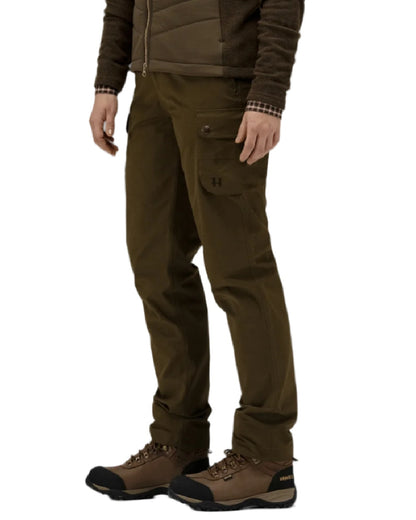 Warm Olive Coloured Harkila Retrieve Lady Trousers on white background 