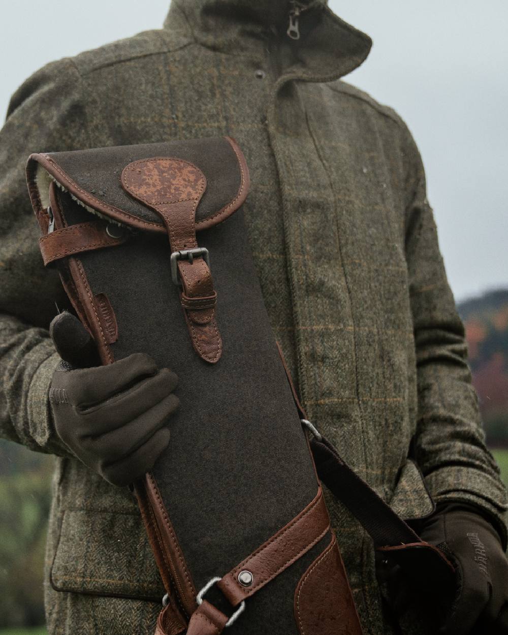 Warm Olive Coloured Harkila Retrieve Shotgun Slip on blurry background 