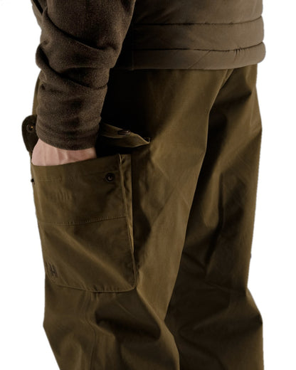 Warm Olive Coloured Harkila Retrieve Trousers on white background 