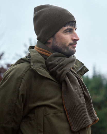 Shadow Brown Rustique Clay Coloured Harkila Reversible Beanie on outdoor background 