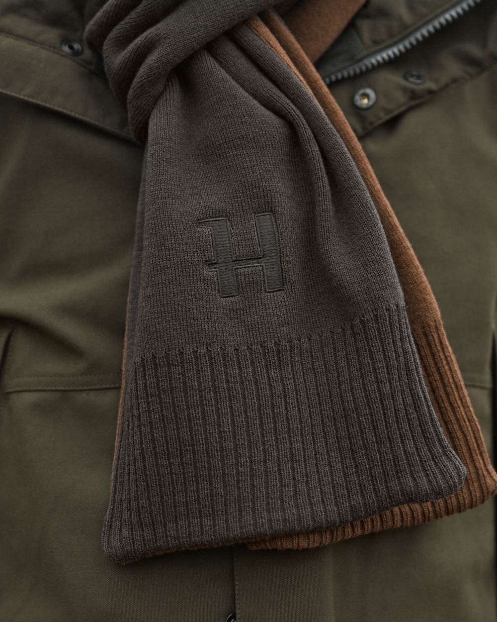 Shadow Brown Rustique Clay Coloured Harkila Reversible Scarf on outdoor background 