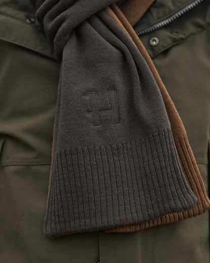 Shadow Brown Rustique Clay Coloured Harkila Reversible Scarf on outdoor background 