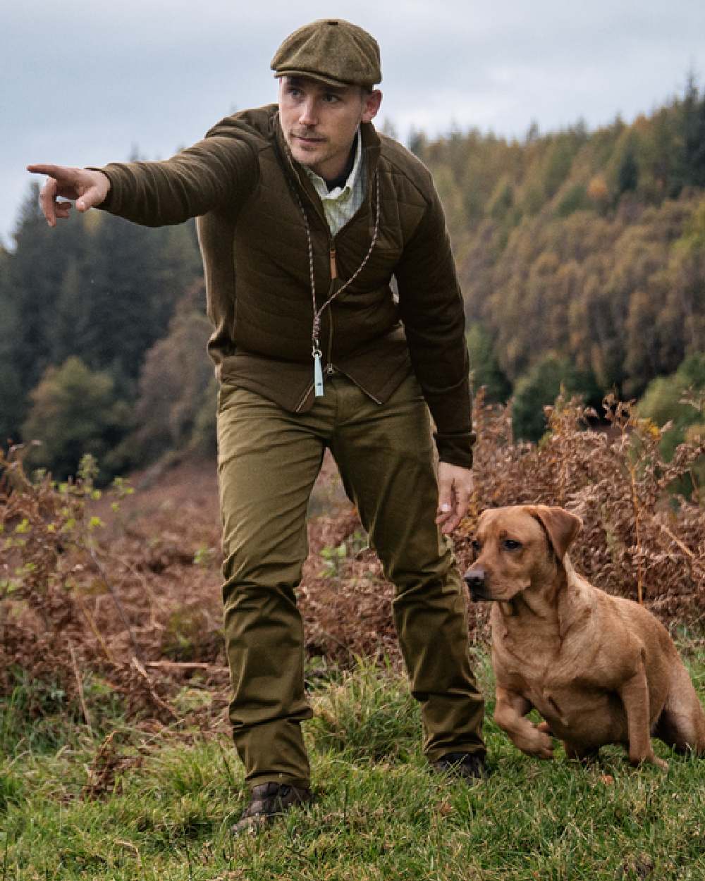 Willow Green Coloured Harkila Sandhem Pro Insulated Cardigan on forest background 