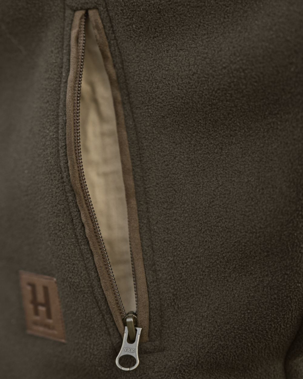 Willow Green Coloured Harkila Sandhem Sherpa Fleece Jacket on outdoor background 