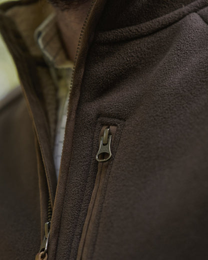 Demitasse Brown Coloured Harkila Sandhem Sherpa Fleece Waistcoat on outdoor background 