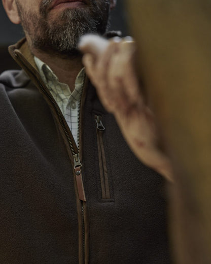 Demitasse Brown Coloured Harkila Sandhem Sherpa Fleece Waistcoat on outdoor background 