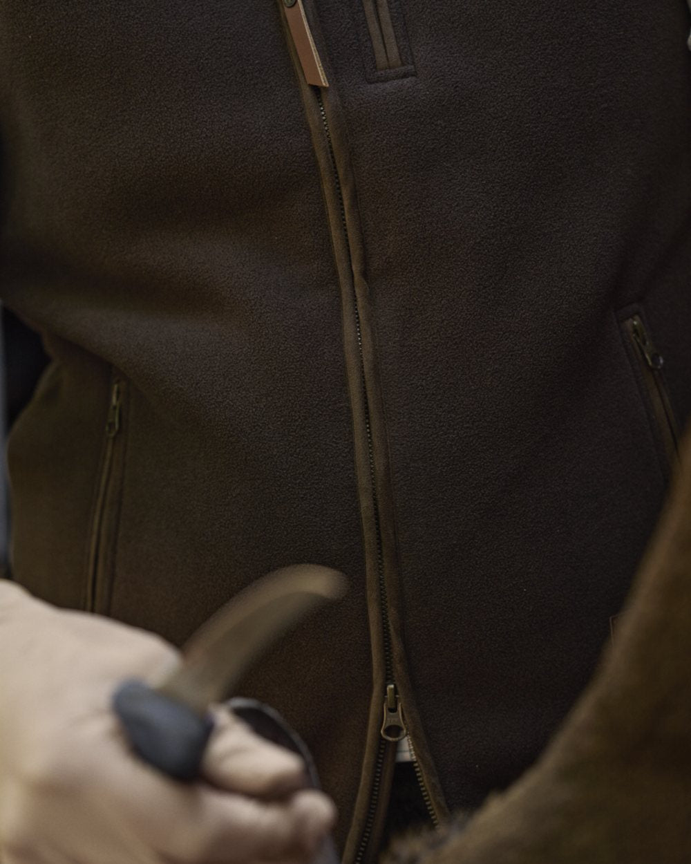 Demitasse Brown Coloured Harkila Sandhem Sherpa Fleece Waistcoat on outdoor background 