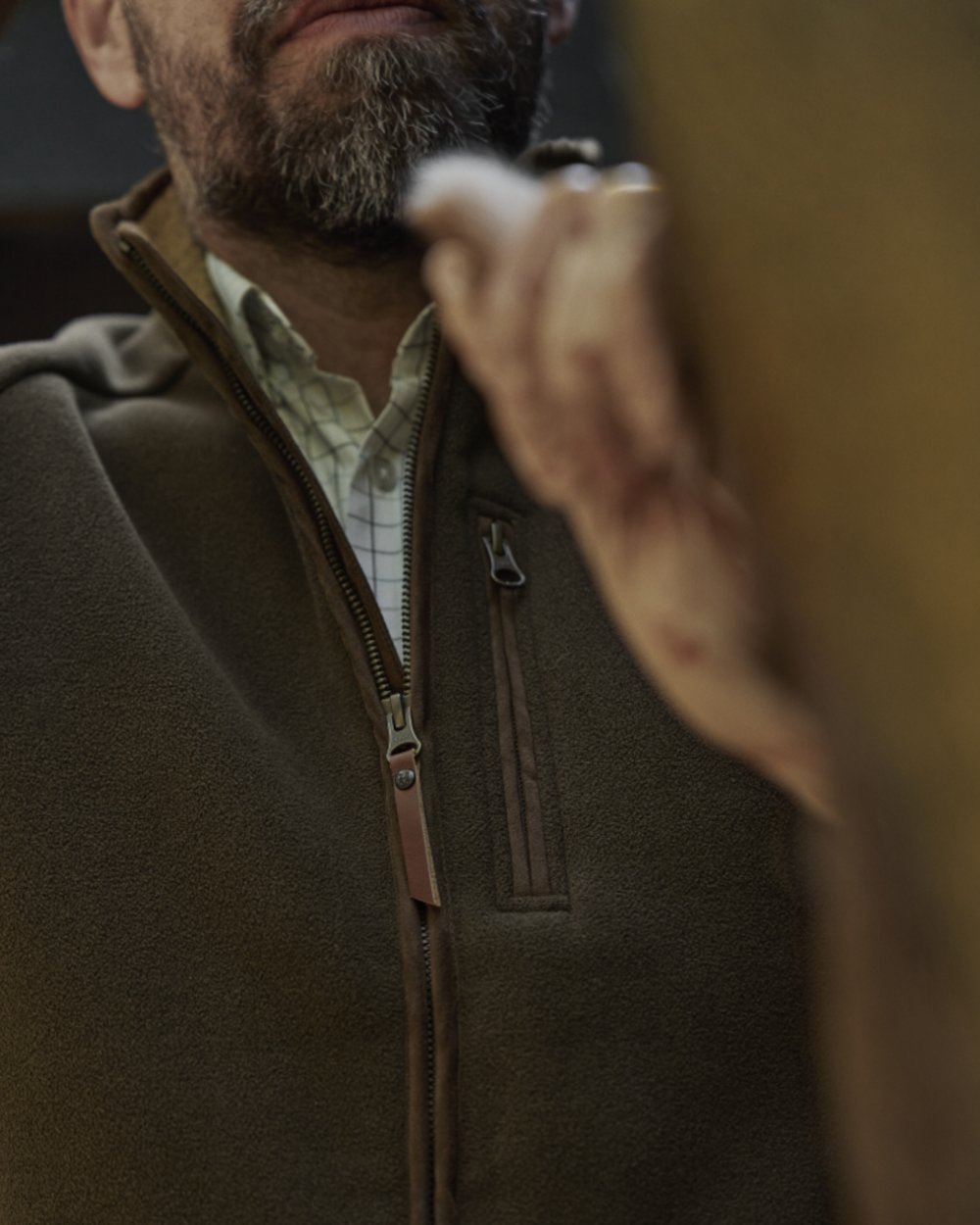 Willow Green Coloured Harkila Sandhem Sherpa Fleece Waistcoat on outdoor background 