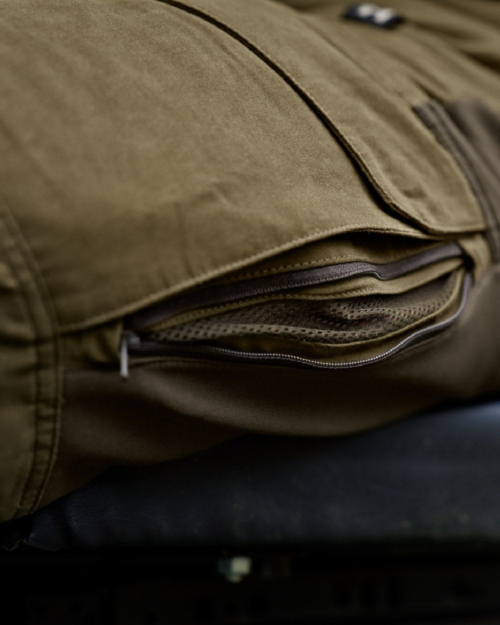 Dark Olive Willow Green Coloured Harkila Scandinavian Trousers on outdoor background 