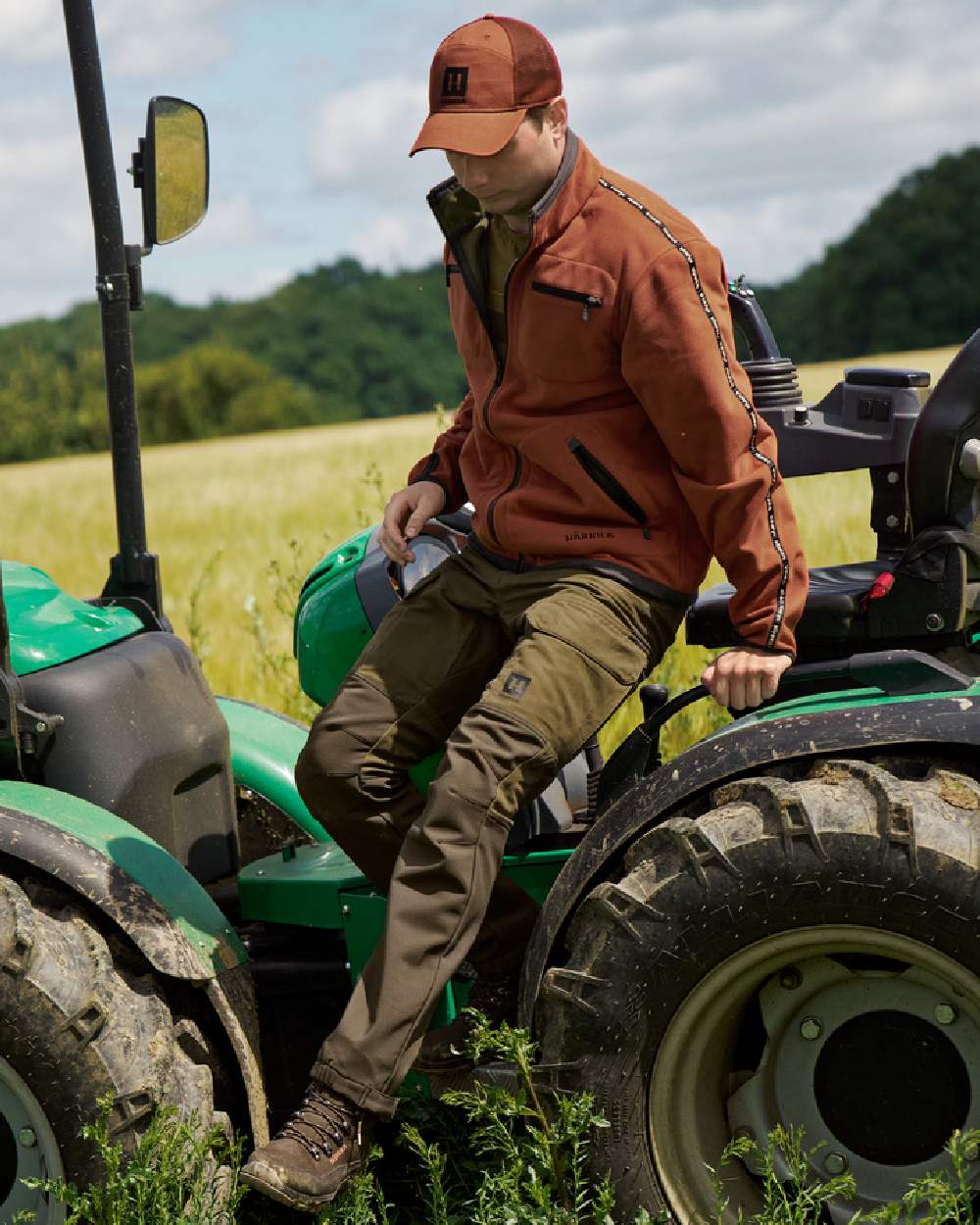 Dark Olive Willow Green Coloured Harkila Scandinavian Trousers on outdoor background 