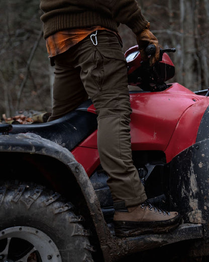 Shadow Brown Deep Brown coloured Harkila Scandinavian Trousers on woodland background 