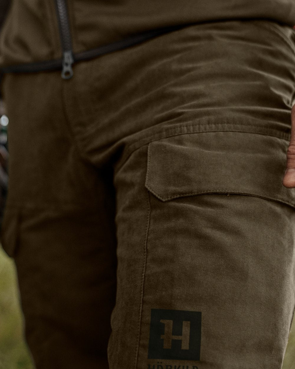 Willow Green Deep Brown Coloured Harkila Scandinavian Trousers on forest background 