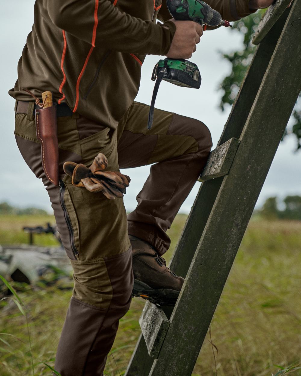 Willow Green Deep Brown Coloured Harkila Scandinavian Trousers on forest background 