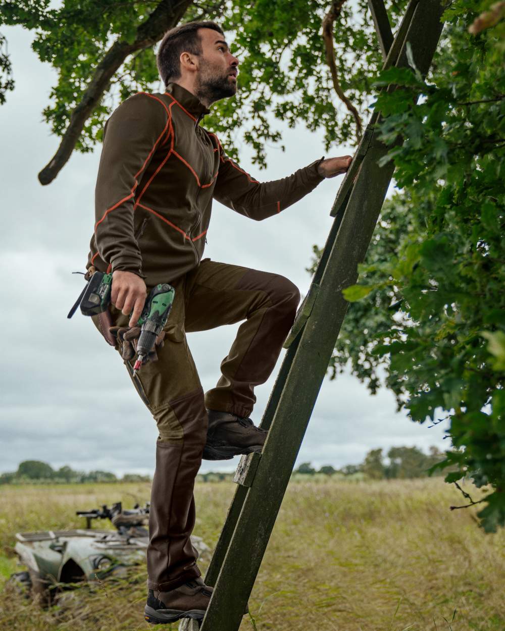 Willow Green Deep Brown Coloured Harkila Scandinavian Trousers on forest background 