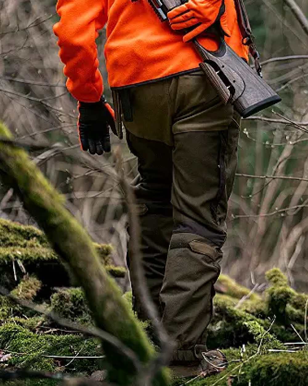Willow Green Golden Willow Green coloured Harkila Teneo Pro Trousers on forest background 