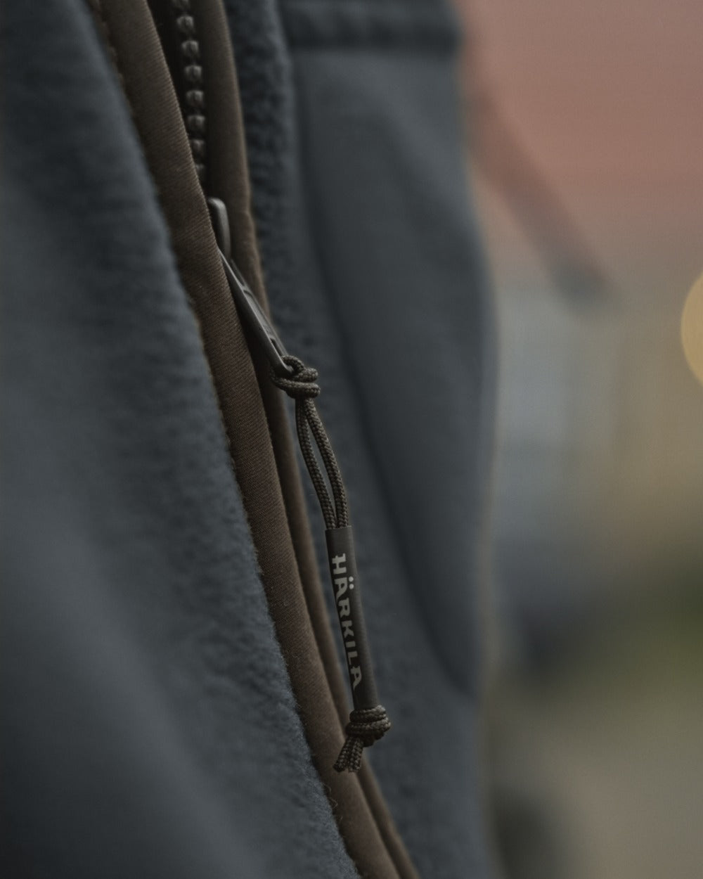 Dark Navy Coloured Harkila Torsby Fleece Jacket on outdoor background 