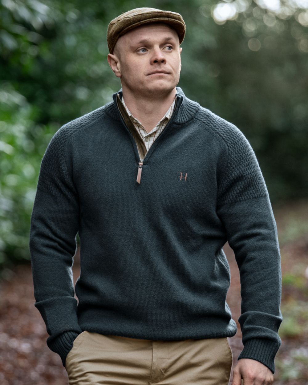 Dark Navy Coloured Harkila Vincent Merino Half Zip Pullover on forest background 
