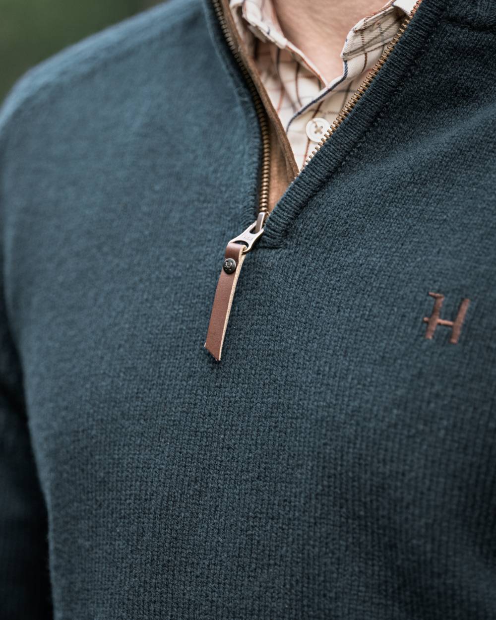 Dark Navy Coloured Harkila Vincent Merino Half Zip Pullover on forest background 