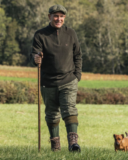 Rosin Coloured Harkila Vincent Merino Half Zip Pullover on forest background 