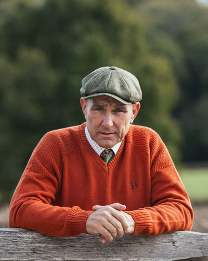 Bombay Brown Coloured Harkila Vincent Merino V-Neck Pullover on forest background 