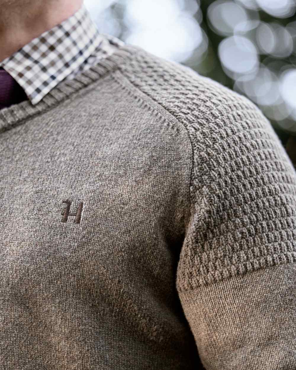 Dark Sand Coloured Harkila Vincent Merino V-Neck Pullover on forest background 
