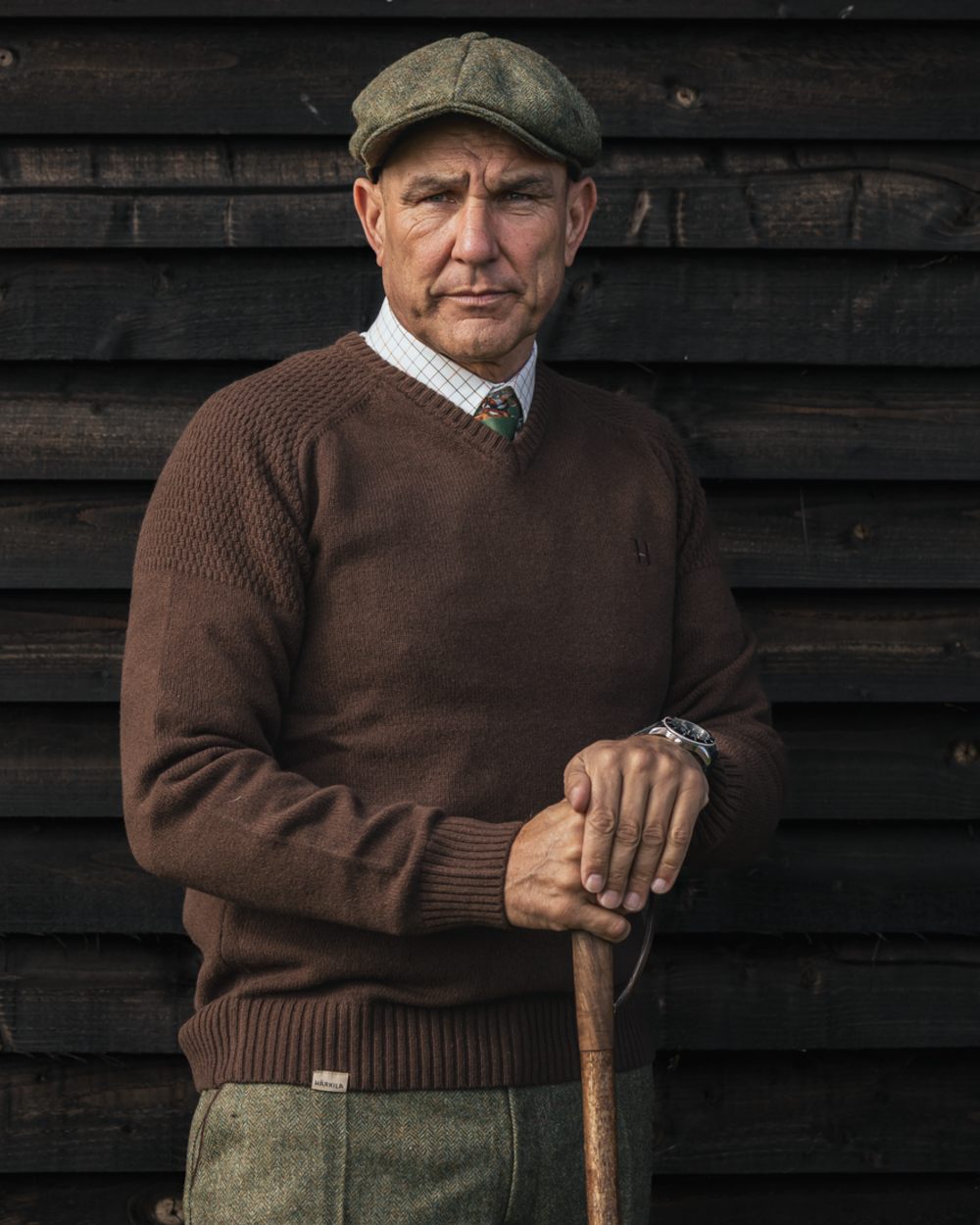 Demitasse Brown Coloured Harkila Vincent Merino V-Neck Pullover on outdoor background 