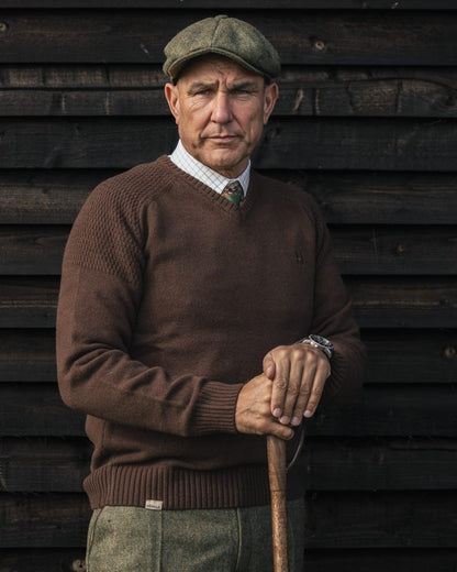 Demitasse Brown Coloured Harkila Vincent Merino V-Neck Pullover on outdoor background 