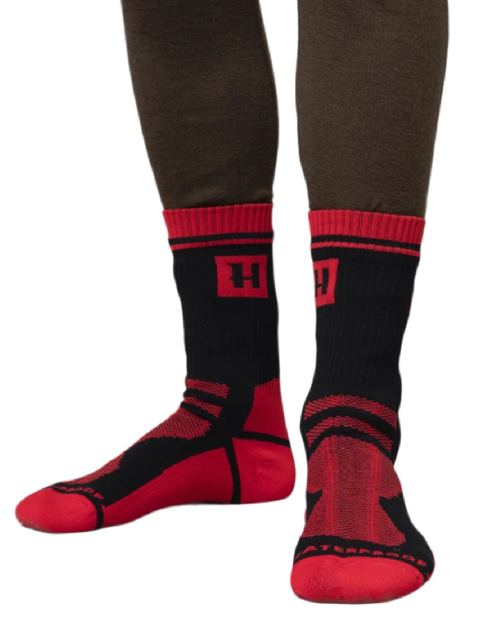 Red Black Coloured Harkila Waterproof Socks on white background 