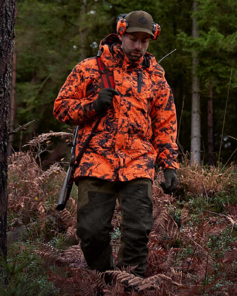 AXIS Orange Blaze Coloured Harkila Wildboar Pro HWS Insulated Jacket on outdoor background 