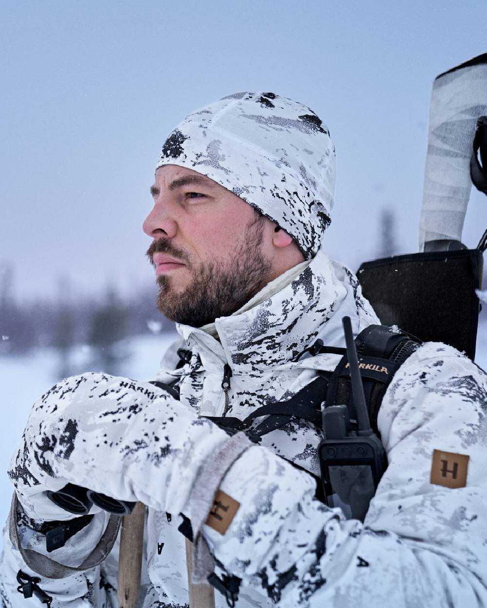 AXIS Snow Coloured Harkila Winter Active Beanie on snow background 