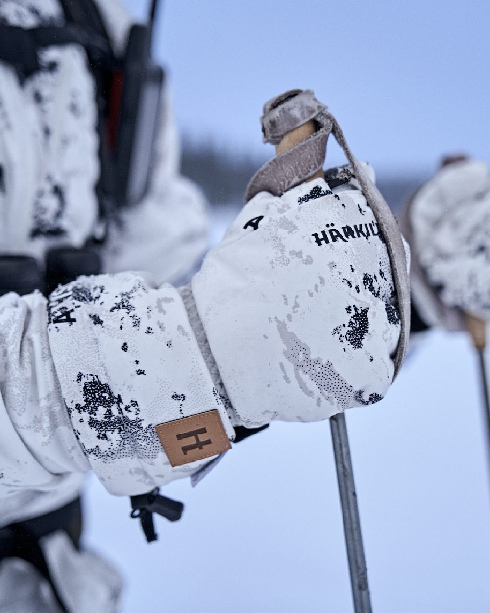 AXIS Snow Coloured Harkila Winter Active WSP Insulated Mittens on snow background 